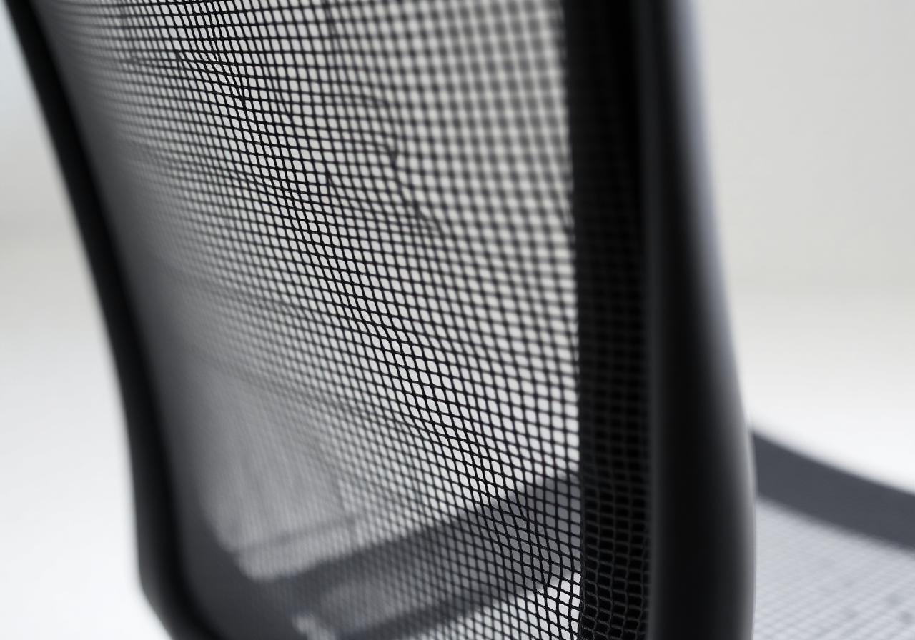 Macro photograph of the woven Pellicle mesh on an Aeron chair backrest